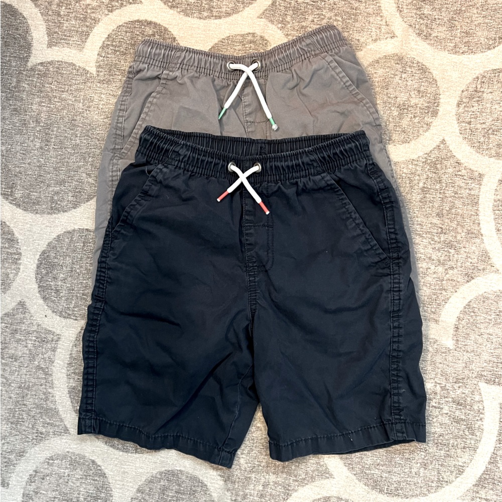 EUC drawstring (elastic waist) flat front shorts. Both pair included in price.